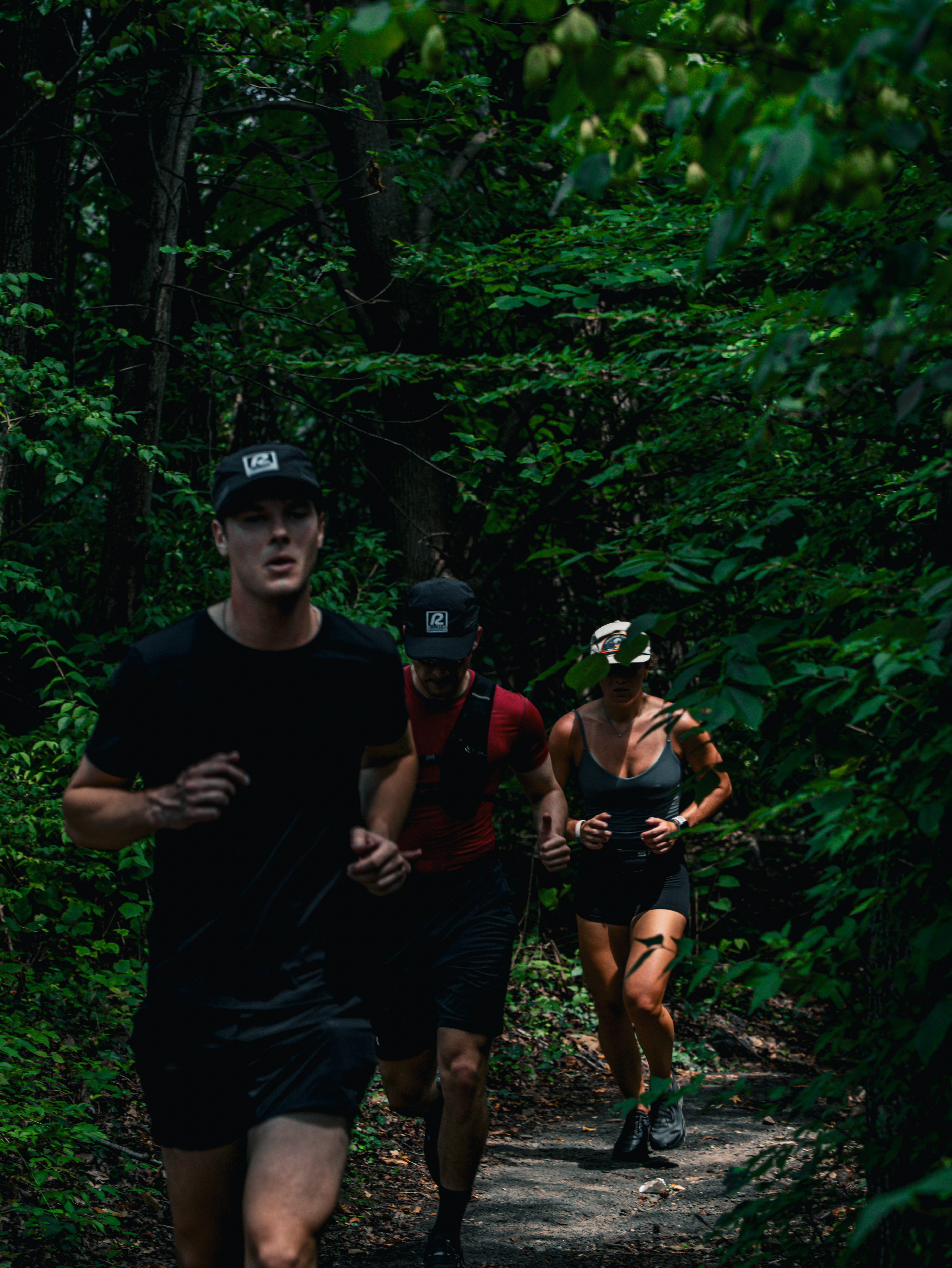 Group trail run through the woods